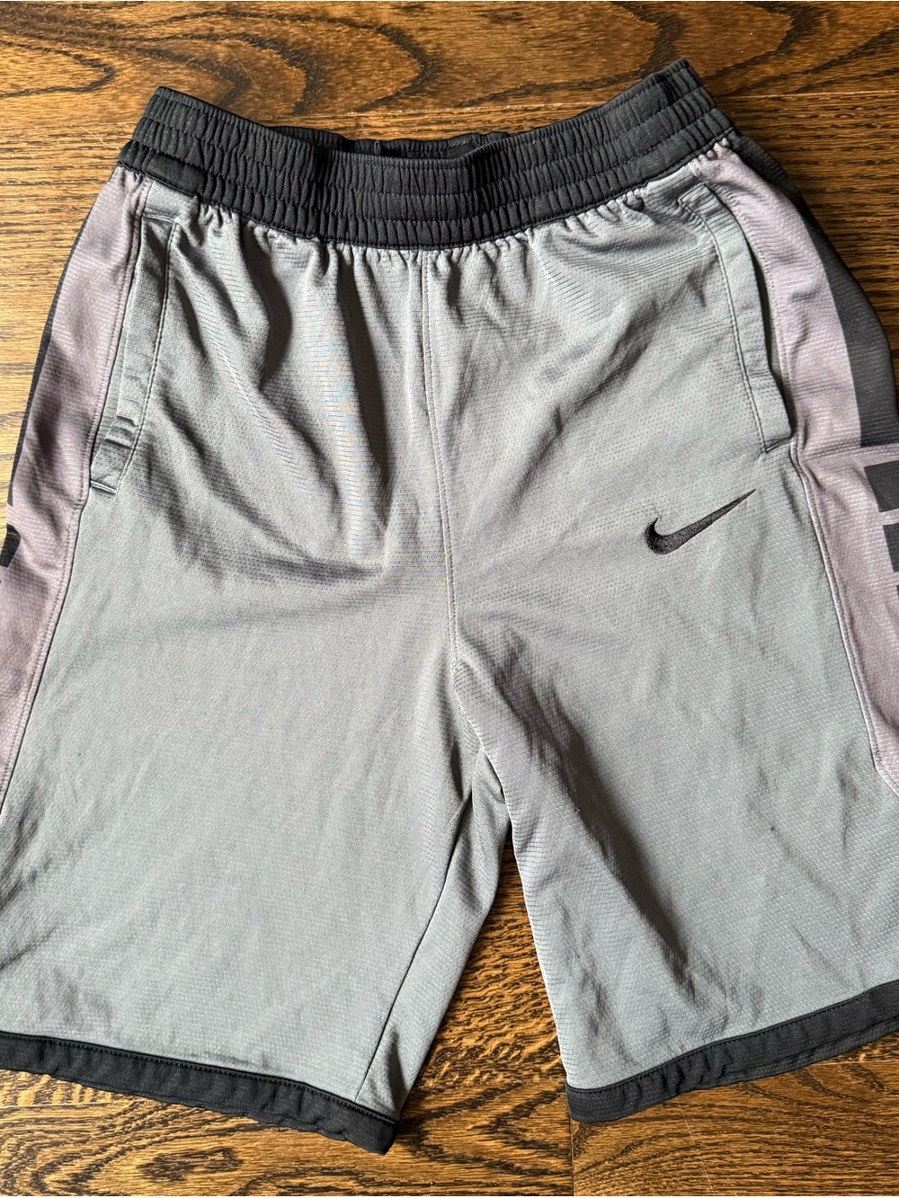 Nike Grey Athletic Shorts with Black Swoosh